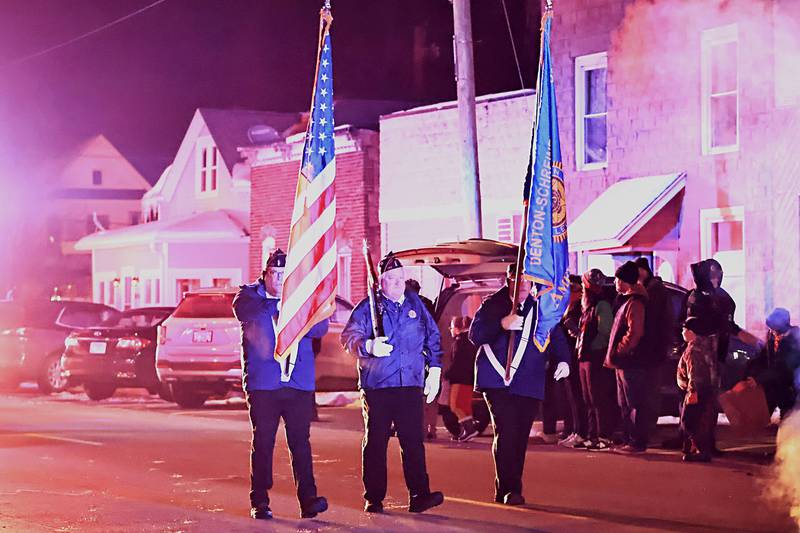 American Legion members Dan Bond (left), Terry Dinges, and Jim Melton proudly marched through the streets in the annual Christmas Parade Saturday, Dec. 7, 2025, in Erie.