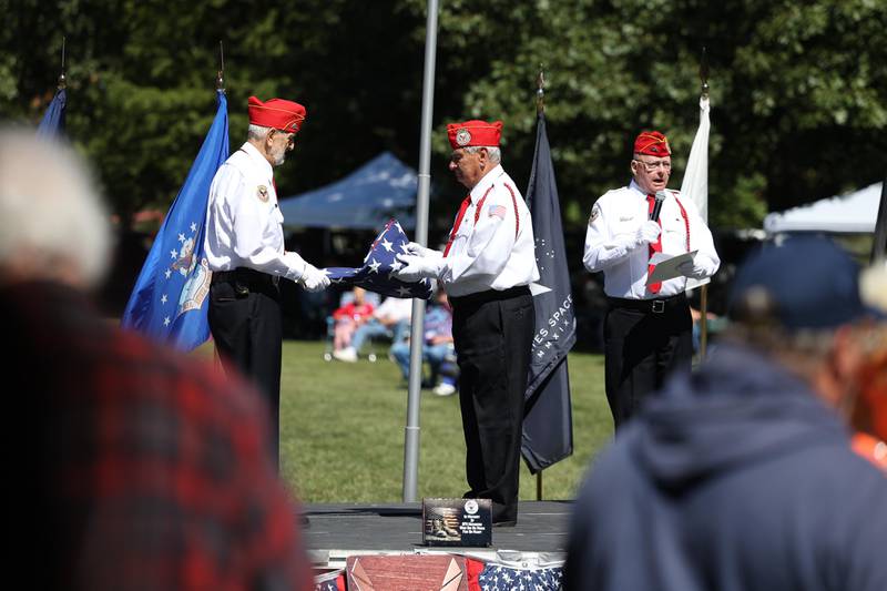 The Color Guard does a ceremonial flag folding demonstration at the 11th Annual Operation Firm Handshake Veteran’s Picnic on Saturday, Sept. 7, 2024 in Coal City.