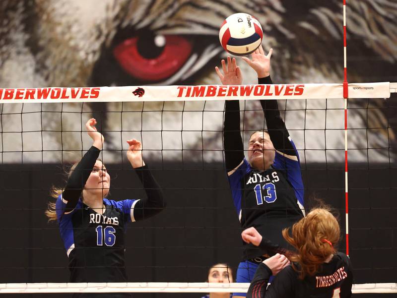 Hinckley-Big Rock's Raven Wagne blocks the spike of Indian Creek's Makayla Bateman during their Class 1A regional play-in game Monday, Oct. 28, 2024, at Indian Creek High School in Shabbona.