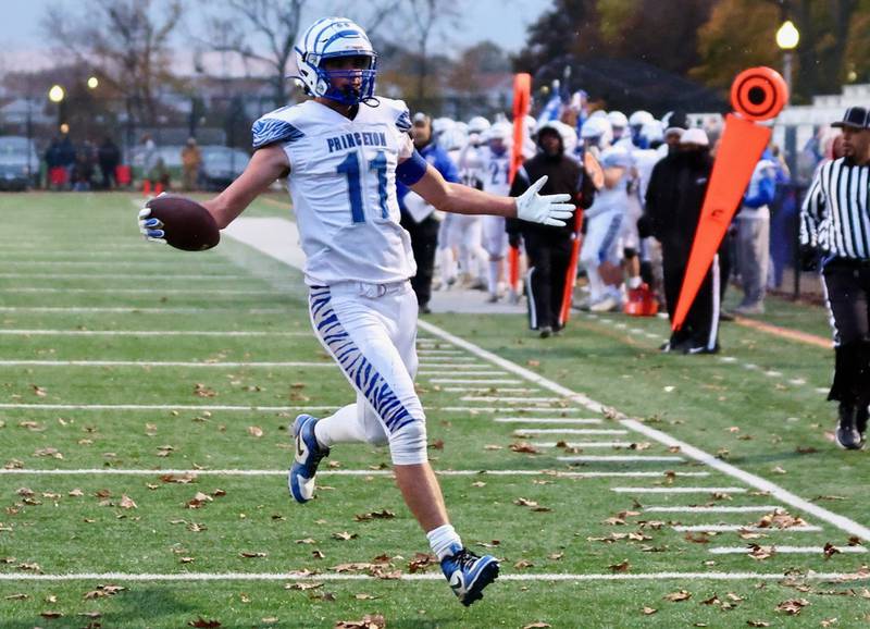 Princeton's Noah LaPorte takes in a touchdown reception to give the Tigers a 27-8 halftime lead over Chicago King in Saturday's game in Chicago. The Tigers won 34-16.