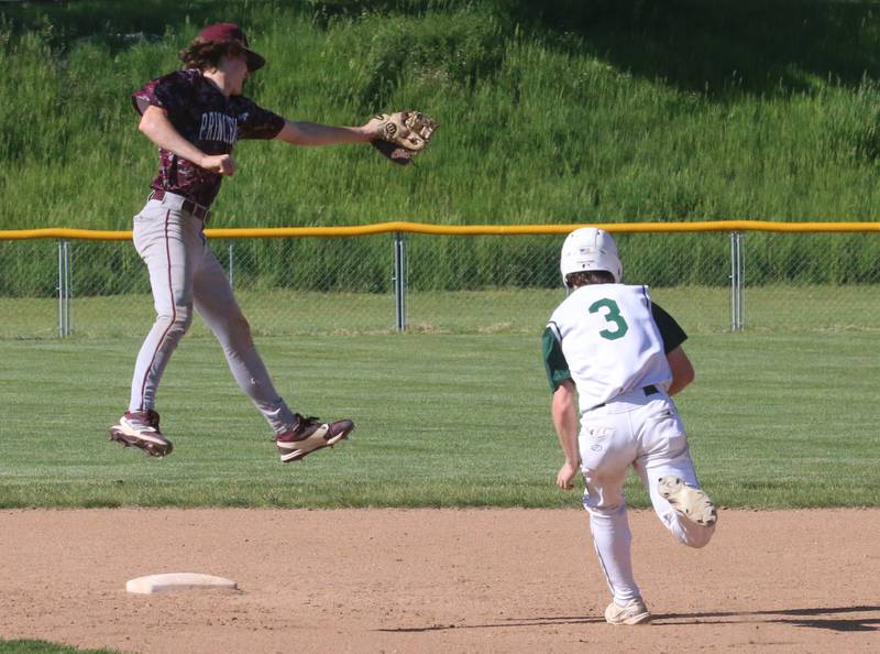St. Bede pitcher Seth Ferrari runs safely into second base as the throw comes in high to Princeville's Jake Williams during the Class 1A Regional semifinal game on Friday, May 17, 2024 at St. Bede Academy.