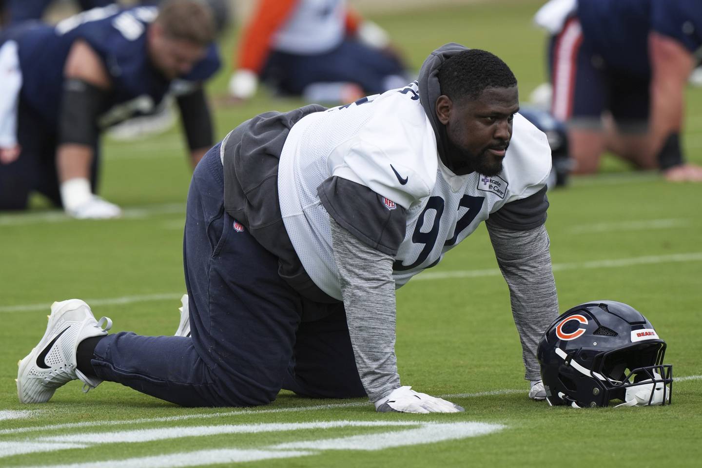 Chicago Bears defensive tackle Andrew Billings warms up during NFL football practice in Lake Forest, Ill., Wednesday, May 28, 2025. (AP Photo/Nam Y. Huh)