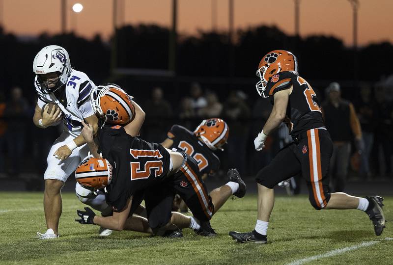 Dixon’s Owen Belzer fights for yards against Byron Friday, Sept. 5, 2025, at Byron High School.