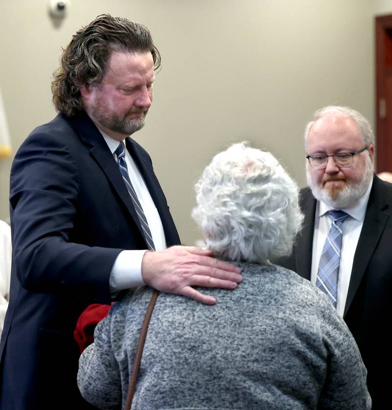 A family member of murdered Sycamore mother and son Patricia and Robert Wilson thank lead prosecutor Scott Schwertley and his team Thursday, March 20, 2025, after the sentencing of Jonathan D. Hurst who was convicted of the 2016 killings. Hurst was sentenced to life in prison.