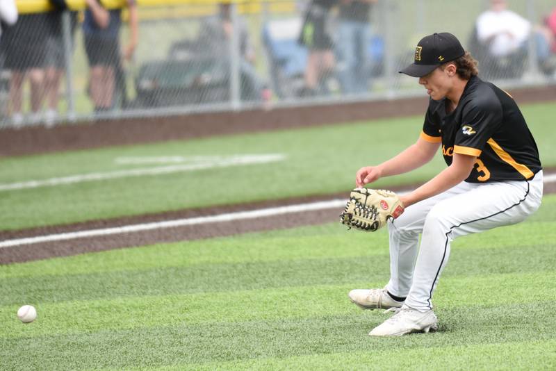 Herscher's Alec Nicholos fields a bunt during the Class 2A Herscher Regional championship against Bishop McNamara Saturday, May 24, 2025.