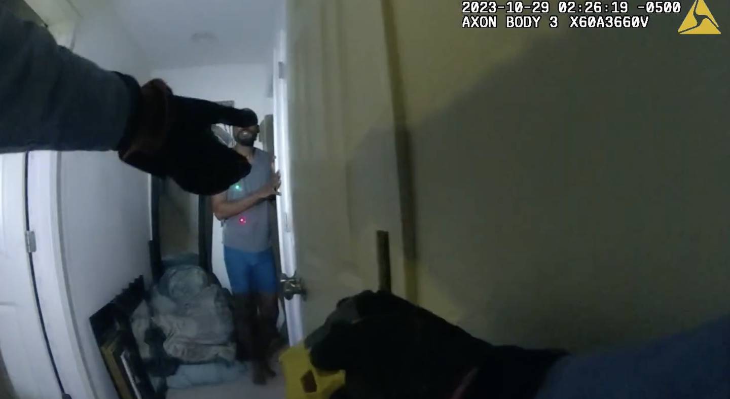 Body camera video still showing Jason Heath with his hands on a wall just seconds before he was hit with a Taser on Oct. 23, 2023 in Joliet. Heath has filed an excessive force lawsuit after a Will County judge dismissed charges against him.