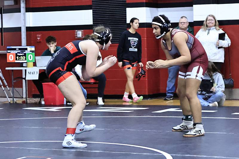 EP's 170 pound wrestler Cayenne Lehr and Moline's Ta'liyah Shelton get ready to battle on Saturday, Jan. 10, 2026, during the EP's Girls Wrestling Invite. EP hosted their first ever girls invitational bringing in 27 other schools from all across Illinois to Erie High School.