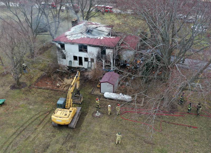 Firefighters respond to a structure fire on North 43rd road about a half mile west of the East 1st road intersection on Thursday, Jan. 2, 2024 in Mendota.