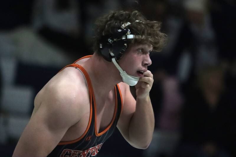 Crystal Lake Central’s Cayden Parks removes his headgear after a win over Cary-Grove’s Will Nichols at 190 pounds in varsity wrestling Thursday, Dec. 19, 2024 at Cary-Grove High School in Cary.