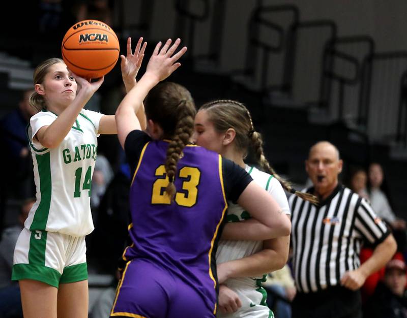 Crystal Lake South's Makena Cleary launched a three-point basket attempt during the Northern Illinois Holiday Classic Championship girl basketball game against Wauconda on Thursday, Dec. 18, 2025, at McHenry High School.