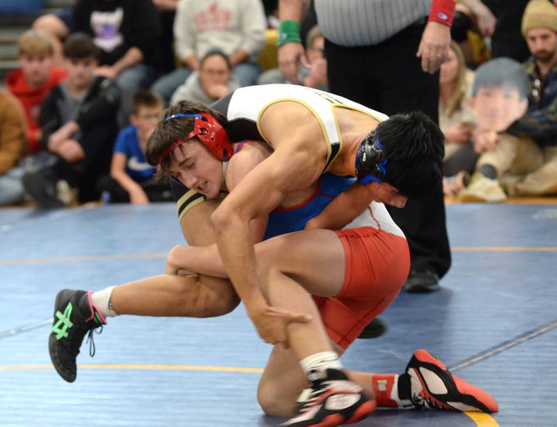 Oregon's Nelson Benesh (bottom) battles Polo-Forreston's Lucas Nelson in the 132-pound title bout at the Polo Wrestling Invitational on Saturday, Jan. 11, 2025 at Polo High School. Benesh won the match.