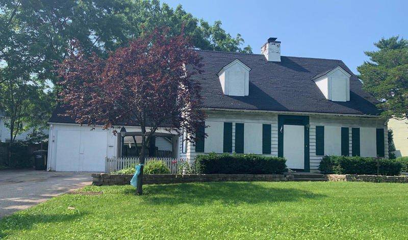 The home at 94 Dole Avenue belonging to accused child killers Andrew Freund Sr. and JoAnn Cunningham.