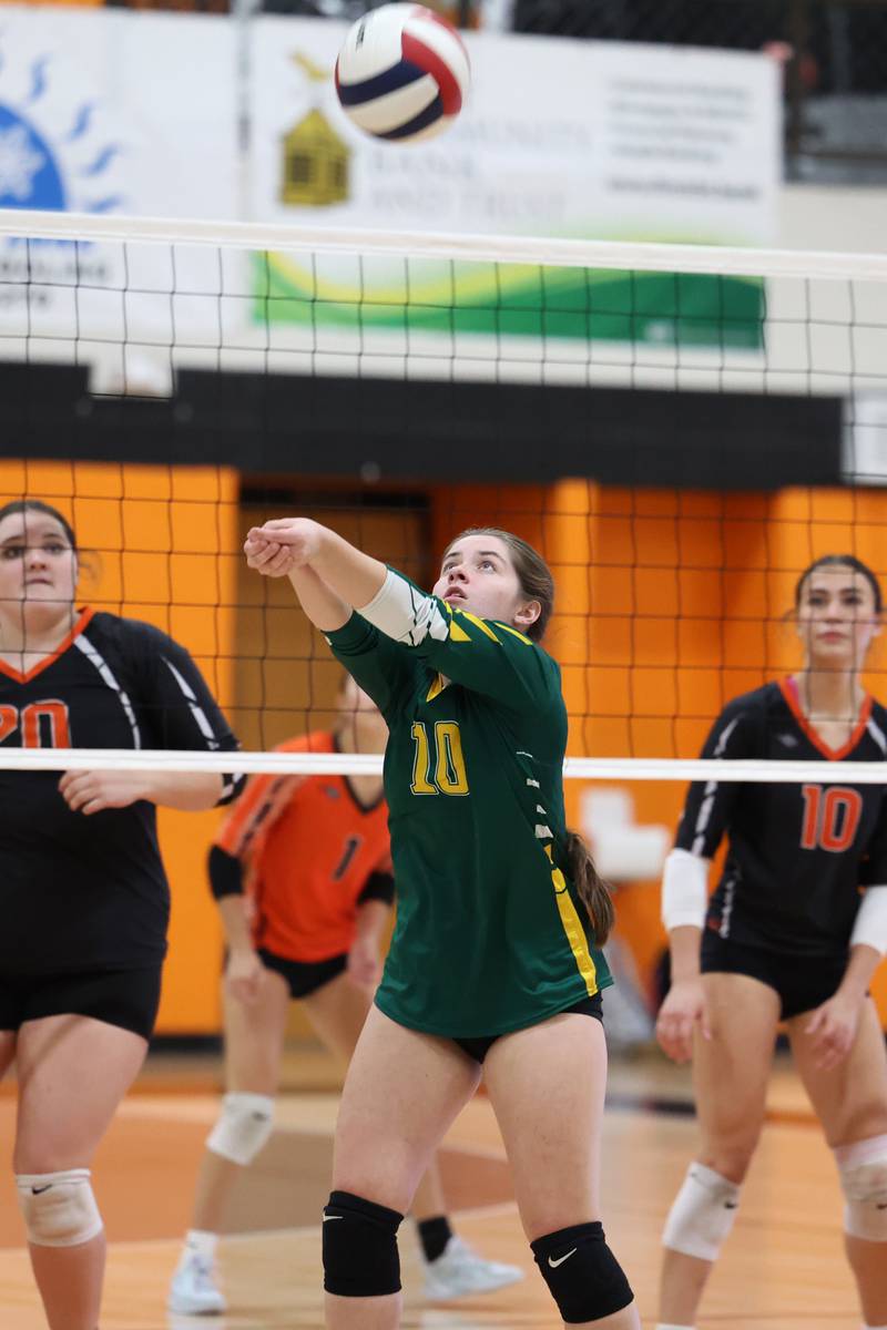 Grant Park's Emily Voigt volleys the ball up for a hitter during the Dragon's loss in two sets, 25-22, 25-23, to Beecher in the RVC championship game on Monday, Oct. 20, 2025, at Beecher High School.