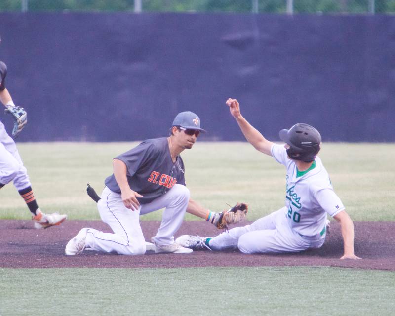 St. Charles East's Nick Miller tags out York's Ryan Turner at second base at the Class 4A Sectional Semi Final on Wednesday, May 31, 2023 in Elgin.