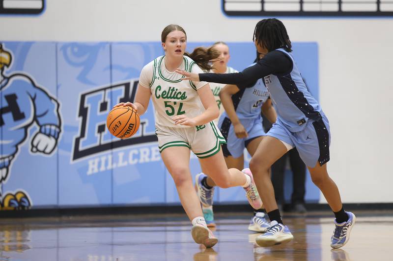 Providence’s Layken Callahan works the ball upcourt against Hillcrest in the Class 3A Hillcrest Sectional championship game on Thursday, Feb. 26, 2026 in Hillcrest.