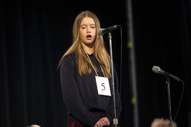 Dixon St. Mary seventh grader Madison Storey appears on stage Thursday, March 9, 2023 during the Lee-Ogle-Whiteside Regional Spelling Bee.