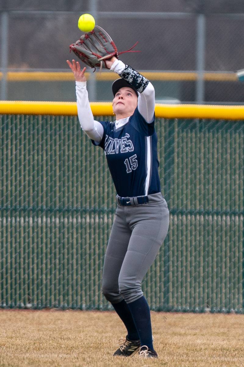 Oswego East's Finley Anderson (15) catches a fly-ball for an out against Metea Valley during a softball game at Metea Valley High School in Aurora on Friday, Mar 24, 2023.