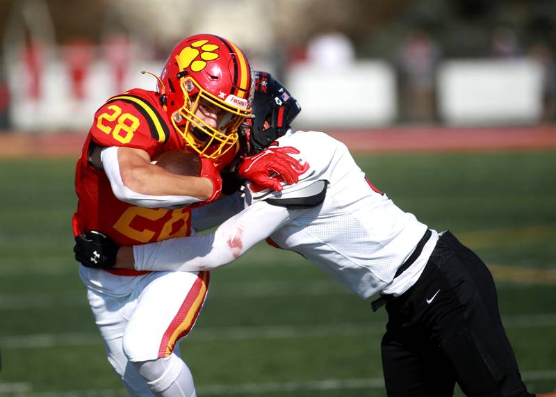 Batavia’s Nathan Whitwell carries the ball during the Class 7A second round playoff game against Lincoln-Way Central in Batavia on Saturday, Nov. 4, 2023.