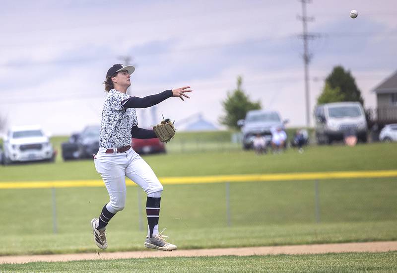 Marengo’s Alex Johnson throws to first for an out against Newman Wednesday, May 28, 2025, in the Class 2A Sectional semifinal in Mendota.