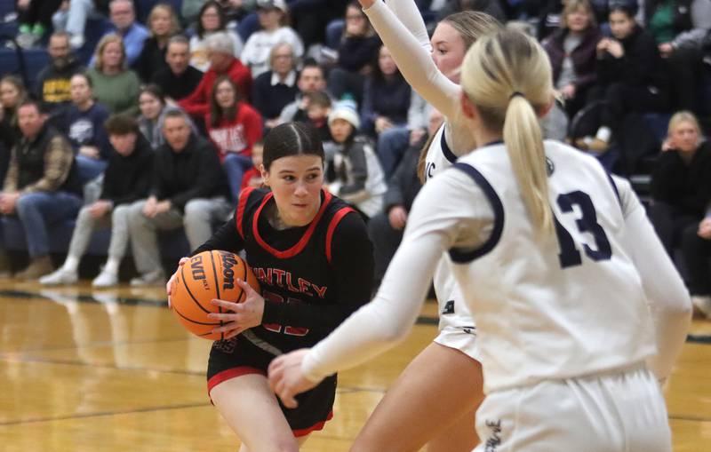 Huntley’s Aubrina Adamik moves the ball in varsity girls basketball on Friday, Jan. 24, 2025, at Cary-Grove High School in Cary.
