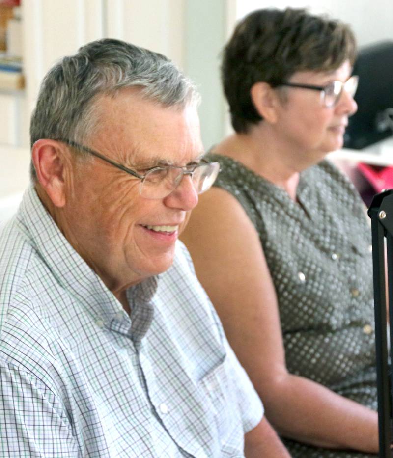 DeKalb County Sheriff Roger Scott smiles as he and and his wife, Marcia talk Tuesday at their home in DeKalb, about the ten kids, seven of them adopted, that they have raised and the over 40 children that they've fostered over the years.