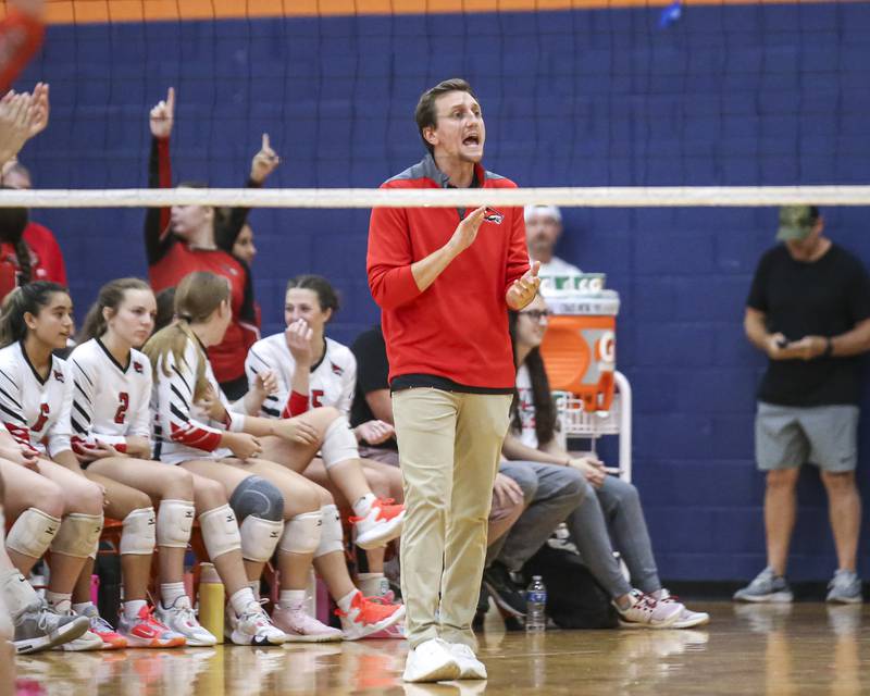 Yorkville's head coach Ryan Donato rallies on the team during volleyball match between Yorkville at Oswego. Sept 23, 2025.