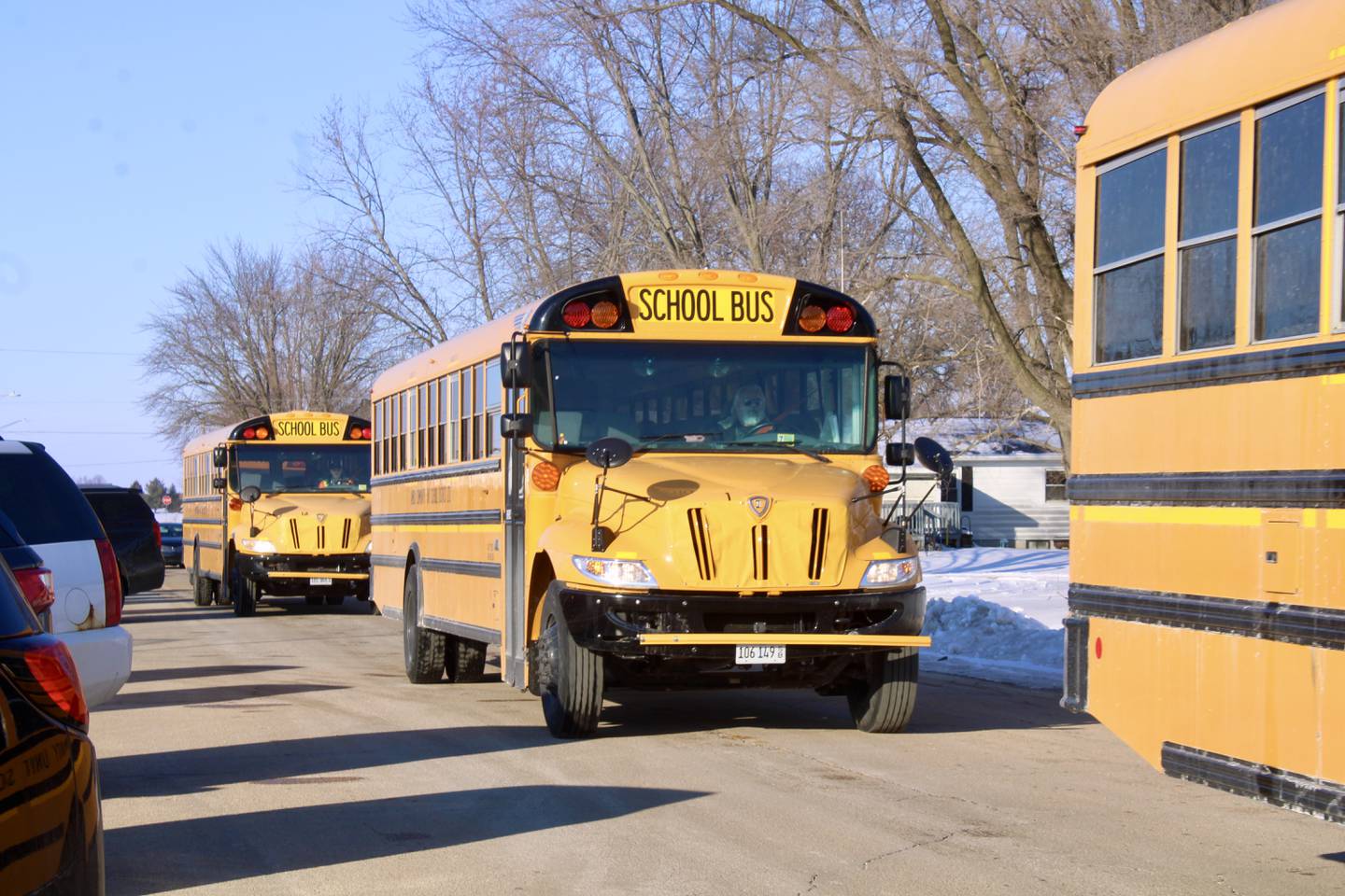 School buses pull away from the junior high side of Amboy Community Unit District 272 on Thursday. The district and its partnership with the Regional Office of Education 47 were recognized on Thursday by the Illinois State Board of Education.
