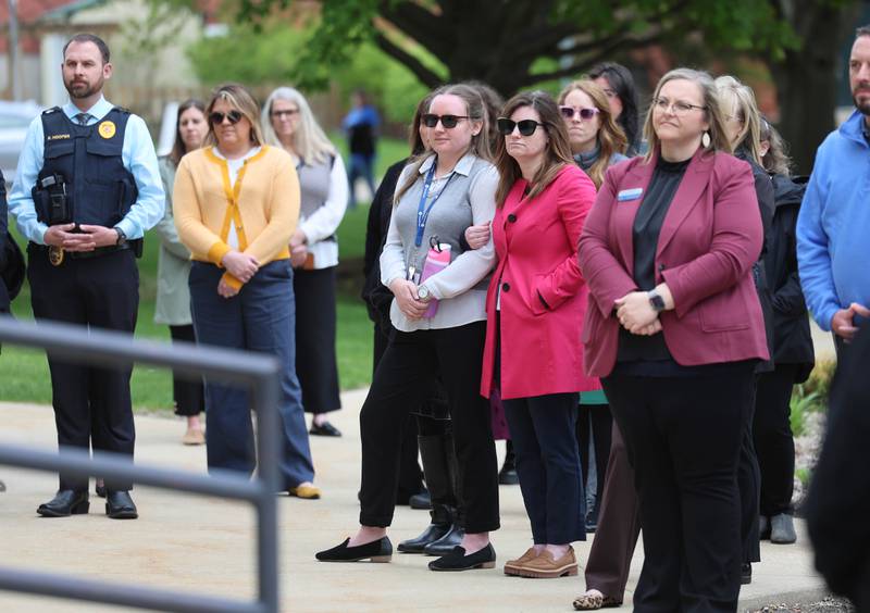 Attendees listen to speakers Wednesday, April 29, 2026, during Hands Around the Courthouse at the DeKalb County Courthouse in Sycamore. The event was held to mark Child Abuse Prevention Month.