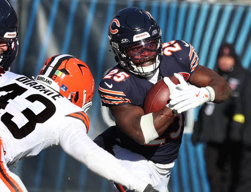 Chicago Bears running back Kyle Monangai looks to get by Cleveland Browns linebacker Mohamoud Diabate during their game Sunday, Dec. 14, 2025, at Soldier Field in Chicago.