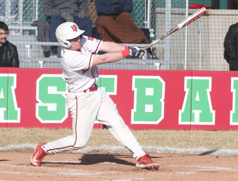L-P's Kaedin Bond connects with a hit against Pontiac on Monday, March 24, 2025 at Huby Sarver Field inside the L-P Athletic Complex in La Salle.
