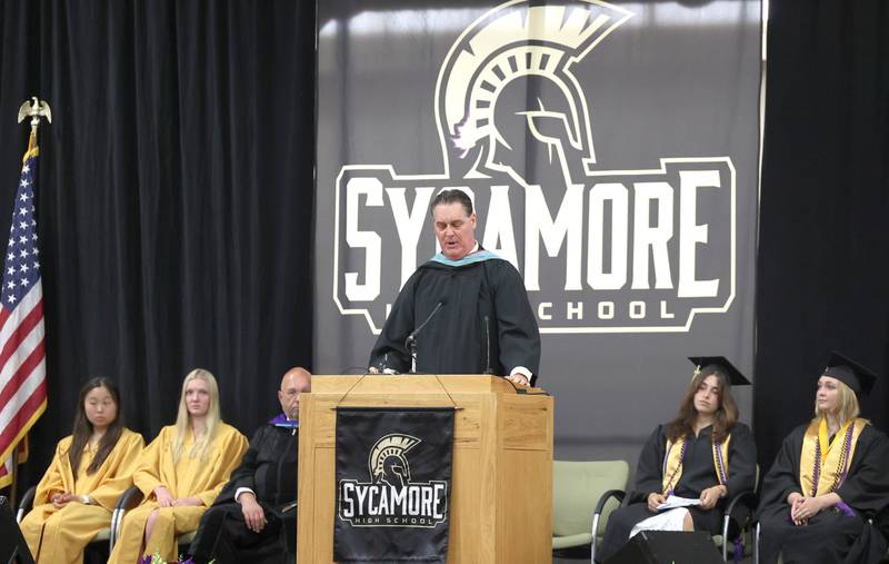 Sycamore High School Principal Tim Carlson addresses the Class of 2023 during commencement ceremonies Sunday, May 28, 2023, at Sycamore High School.