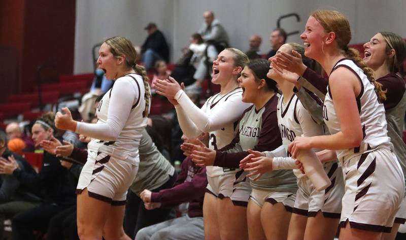 Marengo’s Indians react as they build a lead against Woodstock North in varsity girls basketball on Tuesday, Dec. 2, 2025, at Marengo High School in Marengo.