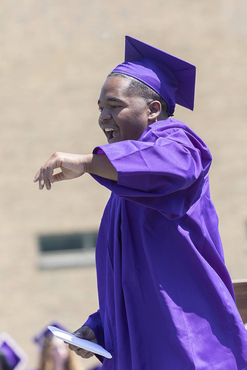Keir Stackhouse celebrates after receiving his diploma Sunday, May 24, 2026, during commencement at Dixon High School.