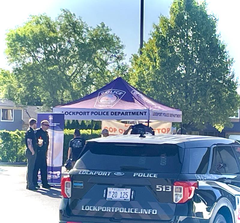 Lockport police are out at the Dunkin’ at 1069 E. 9th St. in Lockport for the  ‘Cop on a Rooftop’ fundraiser for Special Olympics Illinois on Friday, May 16, 2025. Law enforcement across Illinois are participating in this annual event.