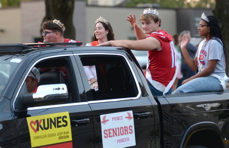 Oregon High School Homecoming Senior Royalty: King Briggs Sellers, Queen Sonya Plescia, Prince Josh Crandall, and Princess Alease McLain, ride in the homecoming parade on Wednesday, Sept. 18, 2024.