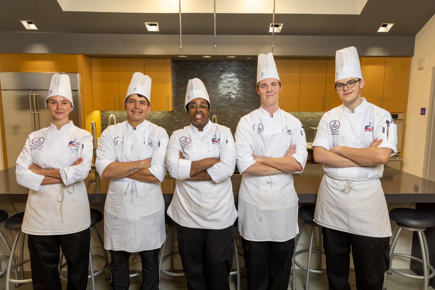 Joliet Junior College's culinary competition team took fourth place at the American Culinary Federation National Convention in July in New Orleans. Pictured (from left) are student team members Noah Hook (captain), Anthony Bozue, Taylor Washington, and Rick Nava and alternate Olivia Valentino.