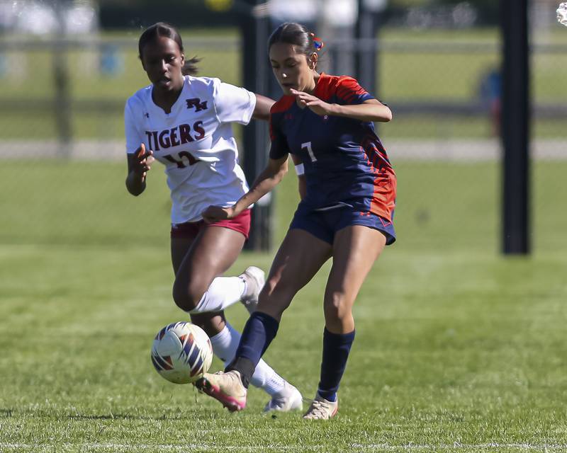 Oswego's Alexandra Ibarra (7) advances the ball down the pitch during a soccer match between Plainfield North at Oswego on Monday, May 11, 2026 in Oswego.