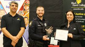Black Hawk College honors Sterling officers who rescued dog from house fire, used CPR to save dog’s life