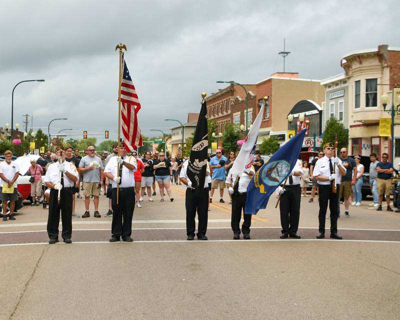 Sycamore VFW presents the colors during the national anthem at the 24th annual Fizz Ehrler Memorial Turning Back Time Car Show in downtown Sycamore on Sunday, July 28, 2024.