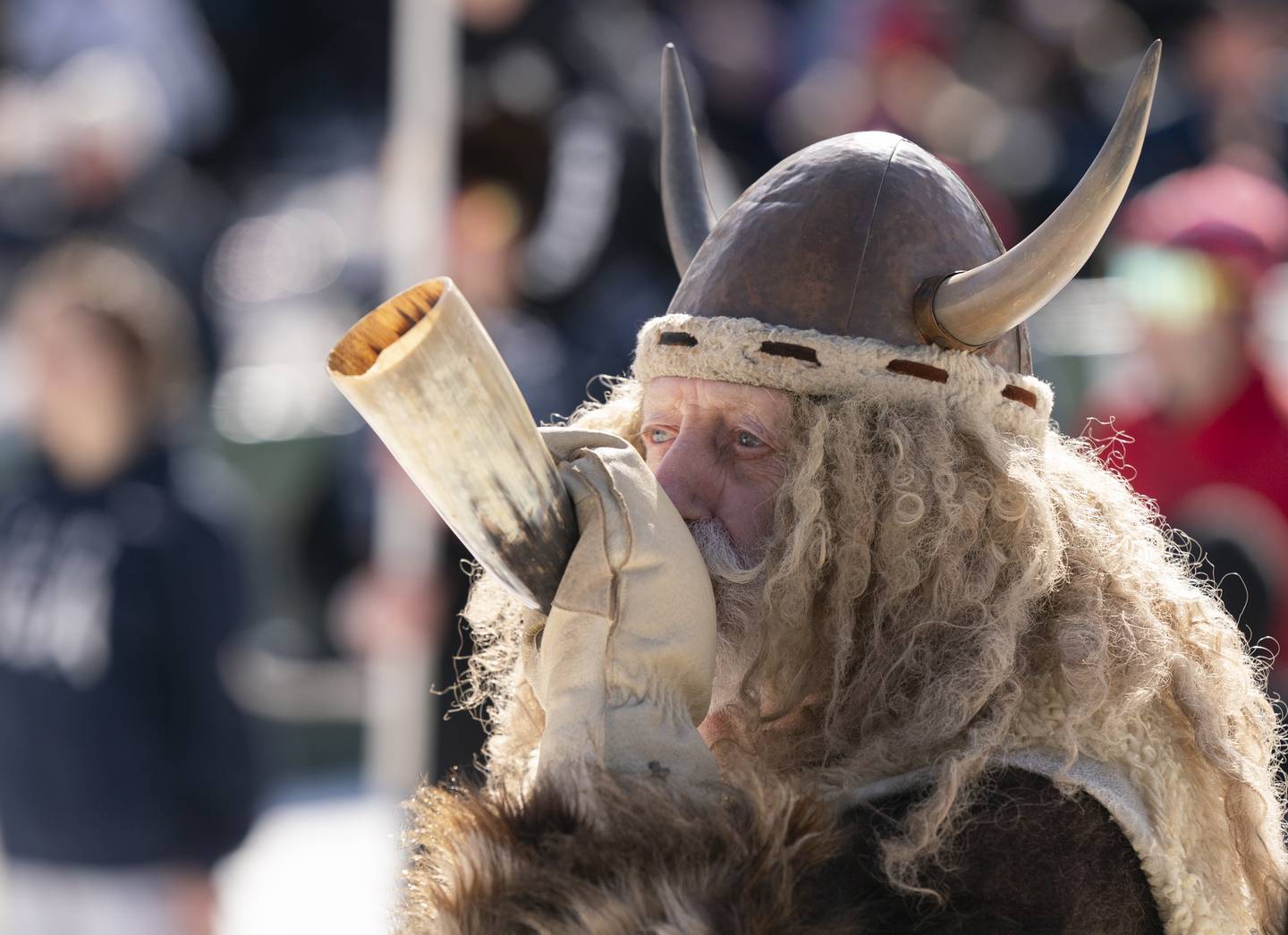 Marty "The Viking' Knapp of Fox River Grove, blows a horn during the opening ceremonies of the Norge Annual Winter Ski Jump Tournament on Sunday, January 26, 2025 at the Norge Ski Jump in Fox River Grove.