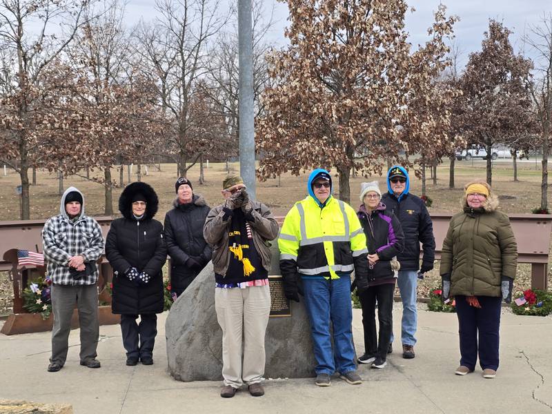 Volunteers pose for a photo after laying wreaths Saturday, Dec. 14, 2024, at the Illinois Fallen Soldiers Tree Memorial during Wreaths Across America.