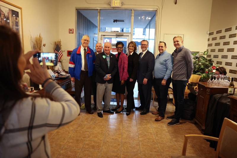 Ed Petka, Jeff Tomczak, Dan Brady, Diane Harris, Kathy Silva, Bob Bodach, Daniel Rippy and Tom Demmer pose for a group photo at the GOP event at Its Amazing in Joliet on Monday.