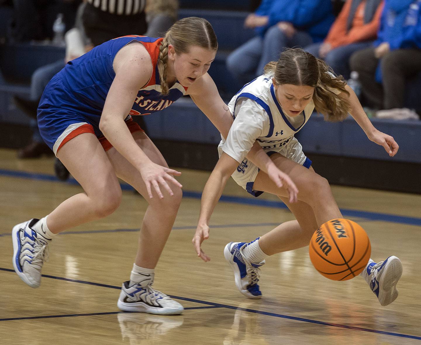 Eastland’s Tatum Grim and Elaina Allen chase after a loose ball Tuesday, Jan. 7, 2025, at Newman High School.