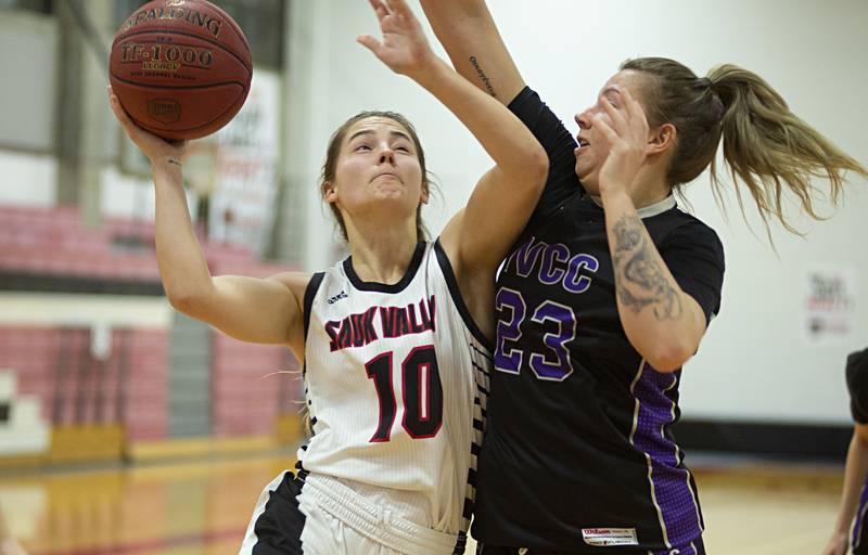 SVCC’s Josie Rank has her shot blocked by IVCC's Maddy Freeman Thursday, Feb. 3, 2022.
