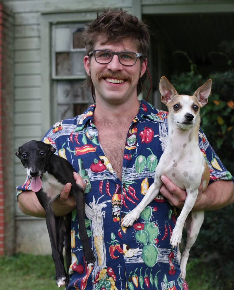 Collin Callahan will read from his newly published book of poems, ‘Thunder Inn’ at Harvey’s Tales in Geneva on Saturday. Callahan grew up in Geneva, but now lives in Tallahassee, Fla. The dog on the left, an Italian greyhound named Julian is Callahan’s dog. The Jack Russell-Chihuahua mix on the right, Scout, is a friend’s dog.