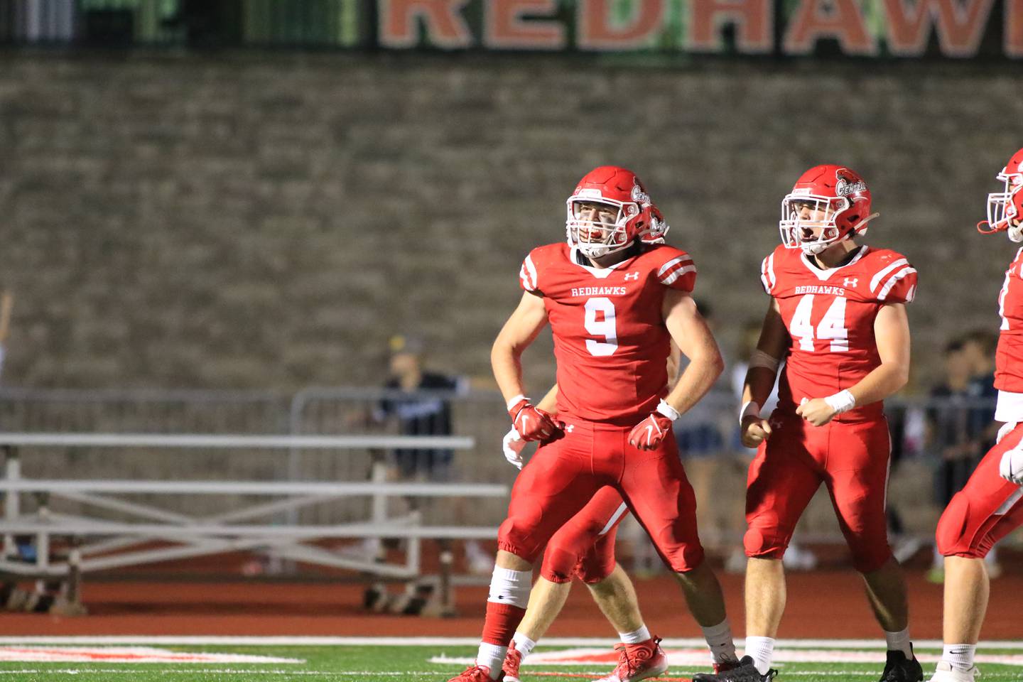 Naperville Central's Maverick Ohle (9) celebrates a big defensive stop during football game between Hinsdale Central at Naperville Central.  August 26, 2022.