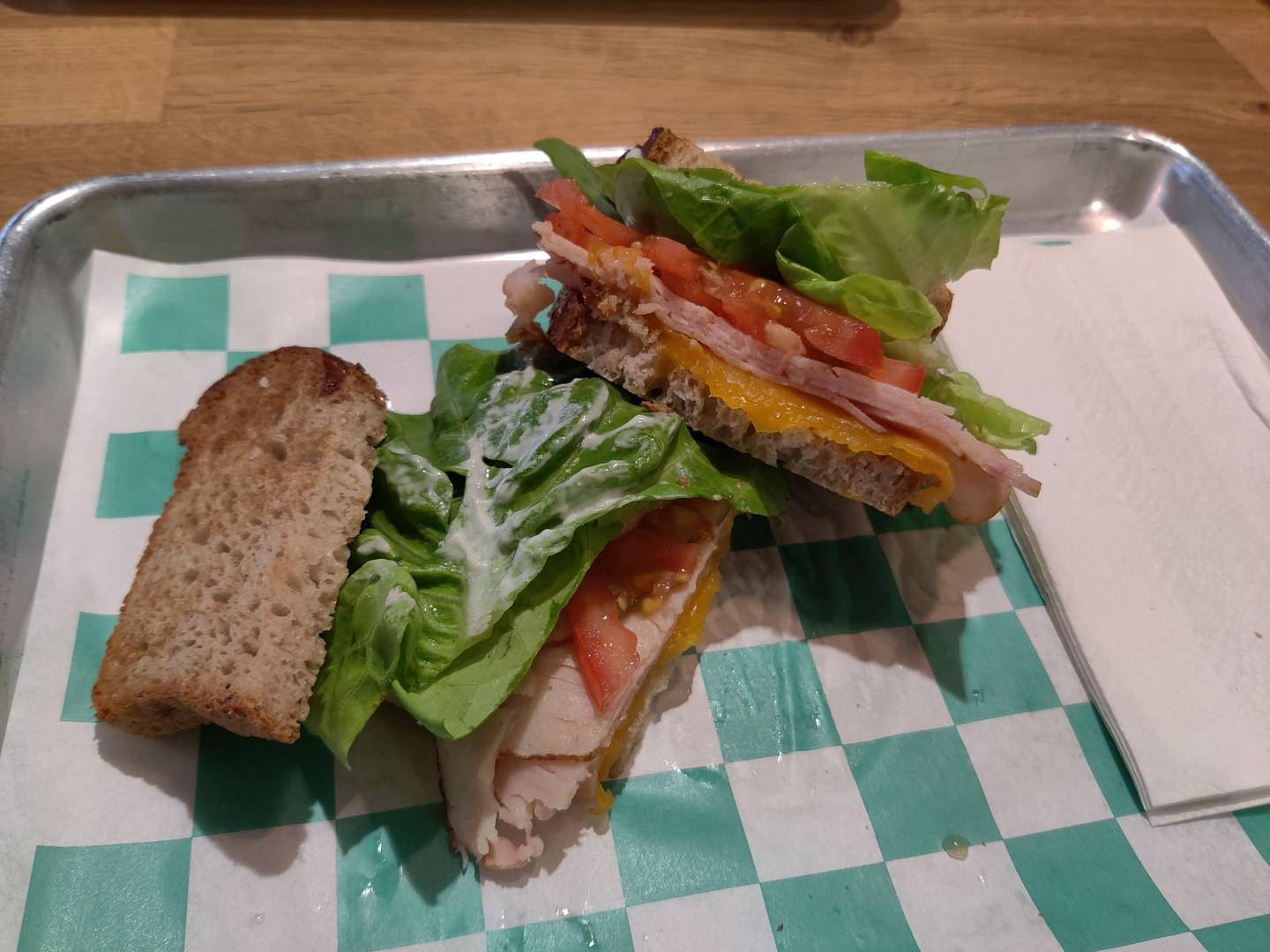 A turkey and cheese sandwich on gluten-free bread at Cafe & Barr in Geneva.