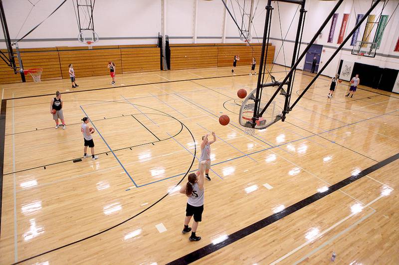 Members of the Kaneland High School varsity girls basketball team practice in the gymnasium of the Kaneland Middle School on Meredith Road in Maple Park.