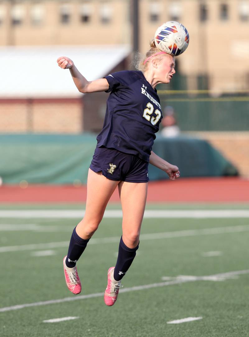 IC Catholic's Molly Ryan (23) heads the ball during the IHSA Class 1A girls soccer super-sectional match between Richmond-Burton and IC Catholic at Concordia University in River Forest on Tuesday, May 23, 2023.