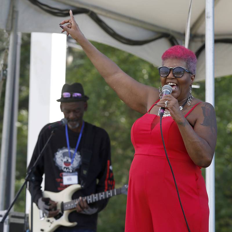 Sharon Lewis of Sharon Lewis and Texas Fire perform during McHenry Area Rotary Club's Blues, Brews & BBQ festival at Petersen Park in McHenry Saturday, August 20, 2022. The fundraising festival featured craft beer, blues music and barbecue and raises funds to go toward endeavors like the club’s Secret Santa program and Rotary Youth Leadership Awards, both of which foster the concept of looking out for one another.